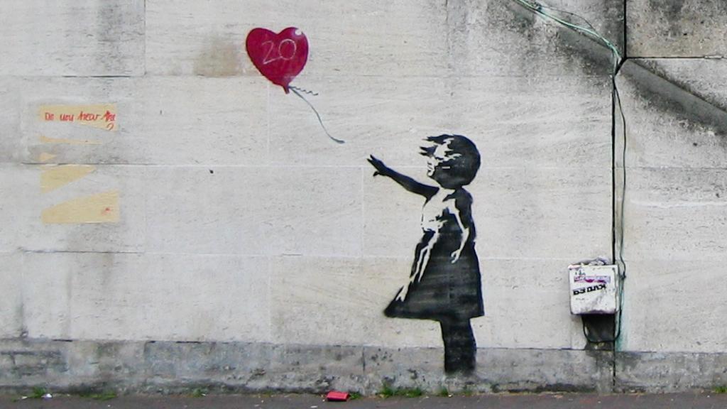 Banksy graffitista strada cinema